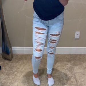 jeans! skinny, light blue and very ripped.